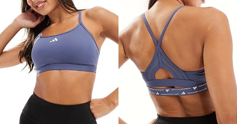 Adidas sports bra in navy purple colour, with extra strap detailing on the back